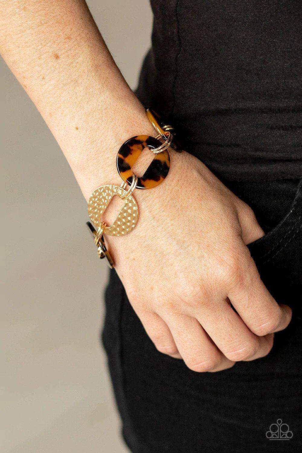 Retro Recharge Brown Tortoise Shell & Gold Bracelet - Paparazzi Accessories- on model - CarasShop.com - Paparazzi Jewelry by Cara Jewels