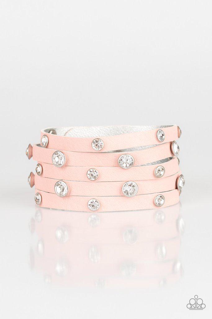 Rhinestone Reputation Pink Leather and Rhinestone Wrap Snap Bracelet - Paparazzi Accessories- on model - CarasShop.com - Paparazzi Jewelry by Cara Jewels