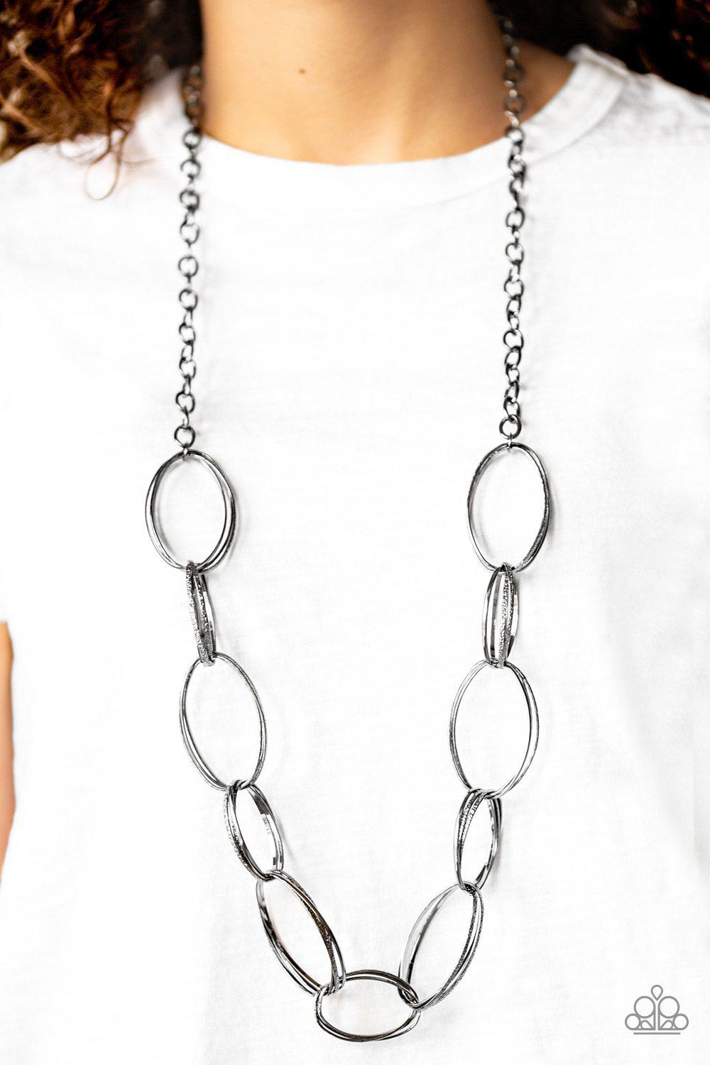 Ring Bling Black Gunmetal Necklace - Paparazzi Accessories- lightbox - CarasShop.com - Paparazzi Jewelry by Cara Jewels