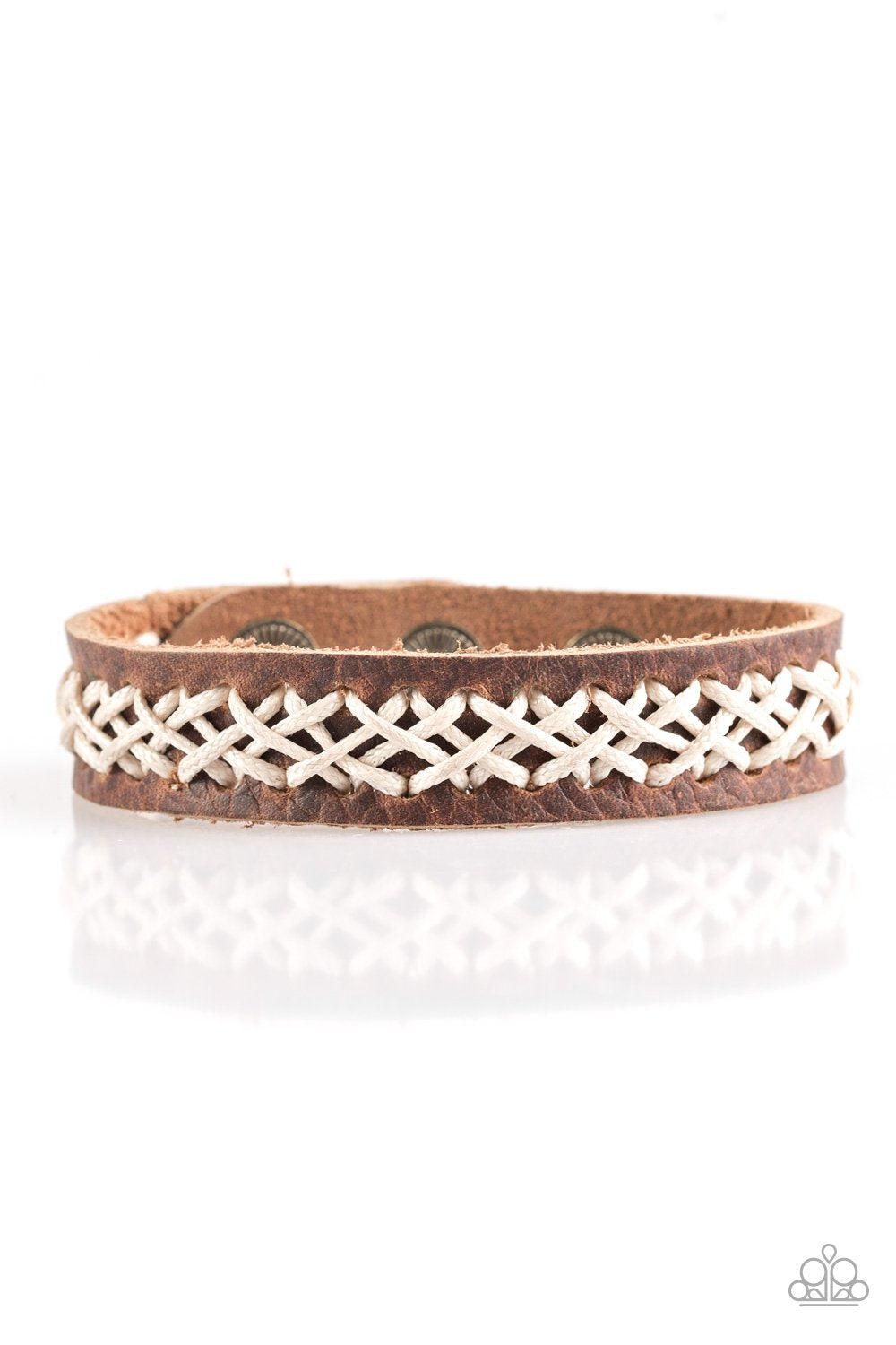 Road Show Rodeo Brown Leather and White Cord Urban Wrap Snap Bracelet - Paparazzi Accessories- on model - CarasShop.com - Paparazzi Jewelry by Cara Jewels