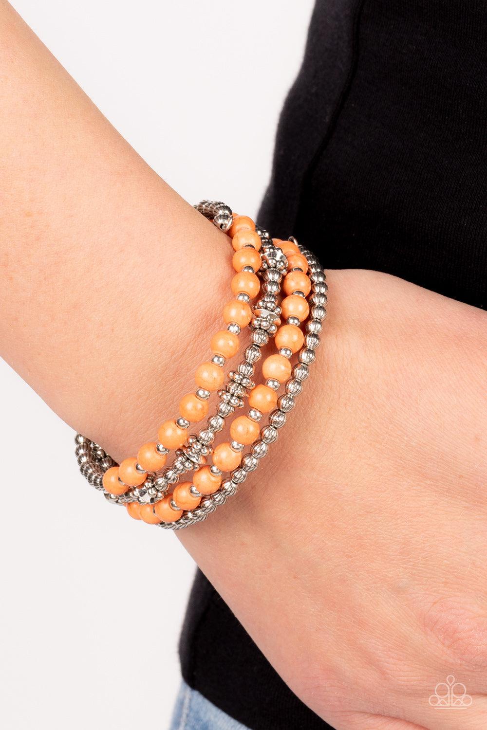 Road Trip Remix Orange Stone Coil Bracelet - Paparazzi Accessories- on model - CarasShop.com - Paparazzi Jewelry by Cara Jewels