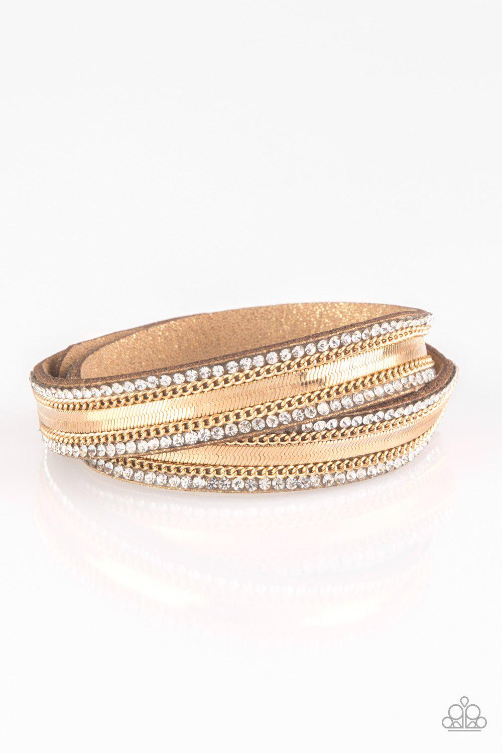 Rocker Rivalry Gold Double-wrap Snap Bracelet - Paparazzi Accessories- on model - CarasShop.com - Paparazzi Jewelry by Cara Jewels