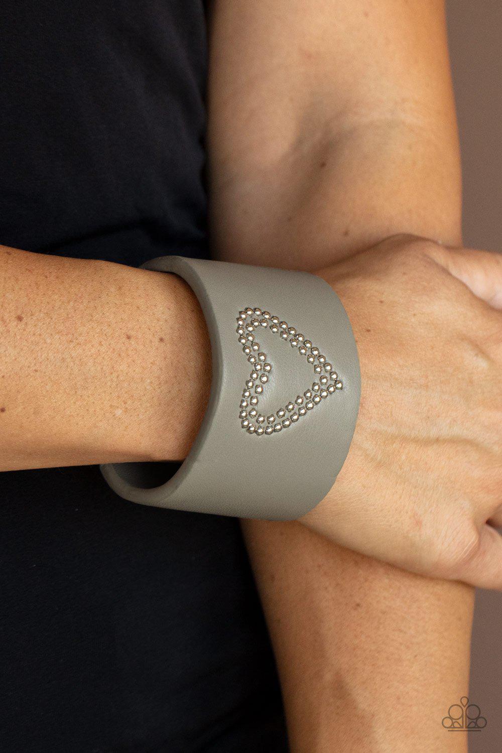 Rodeo Romance Silver Leather Heart Cuff Bracelet - Paparazzi Accessories- on model - CarasShop.com - Paparazzi Jewelry by Cara Jewels