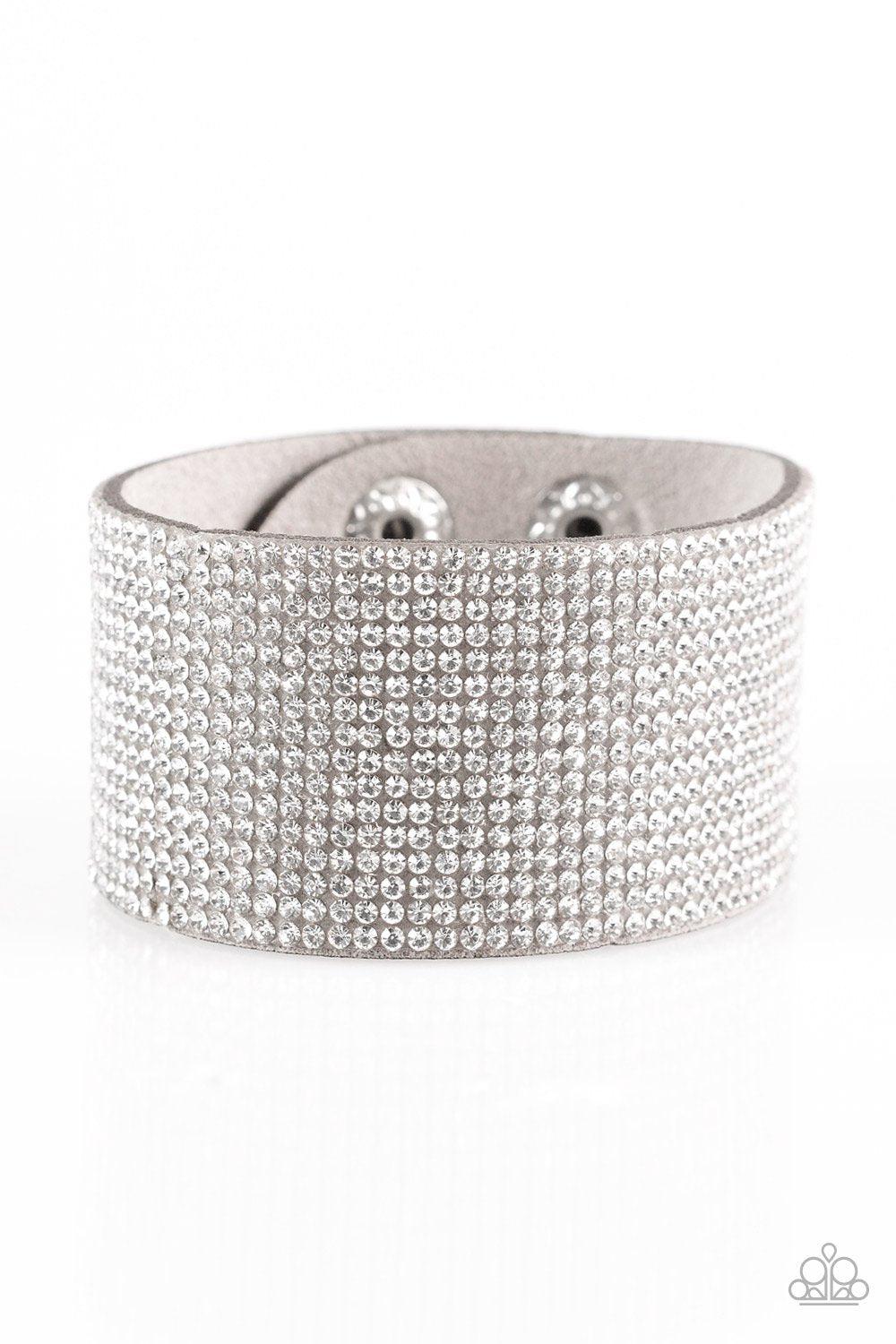 Roll With The Punches Silver and White Rhinestone Urban Wrap Snap Bracelet - Paparazzi Accessories- on model - CarasShop.com - Paparazzi Jewelry by Cara Jewels