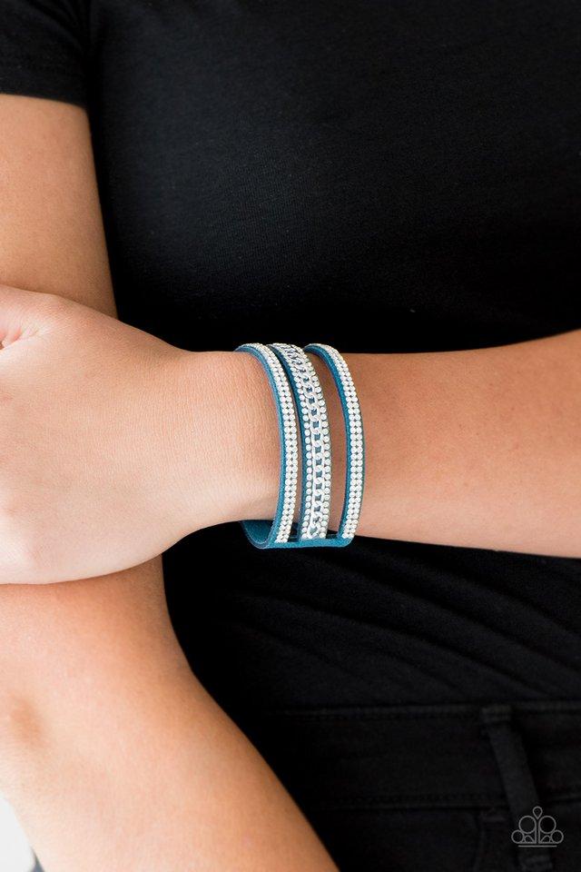 Rollin' In Rhinestones Blue Urban Wrap Snap Bracelet - Paparazzi Accessories- on model - CarasShop.com - Paparazzi Jewelry by Cara Jewels