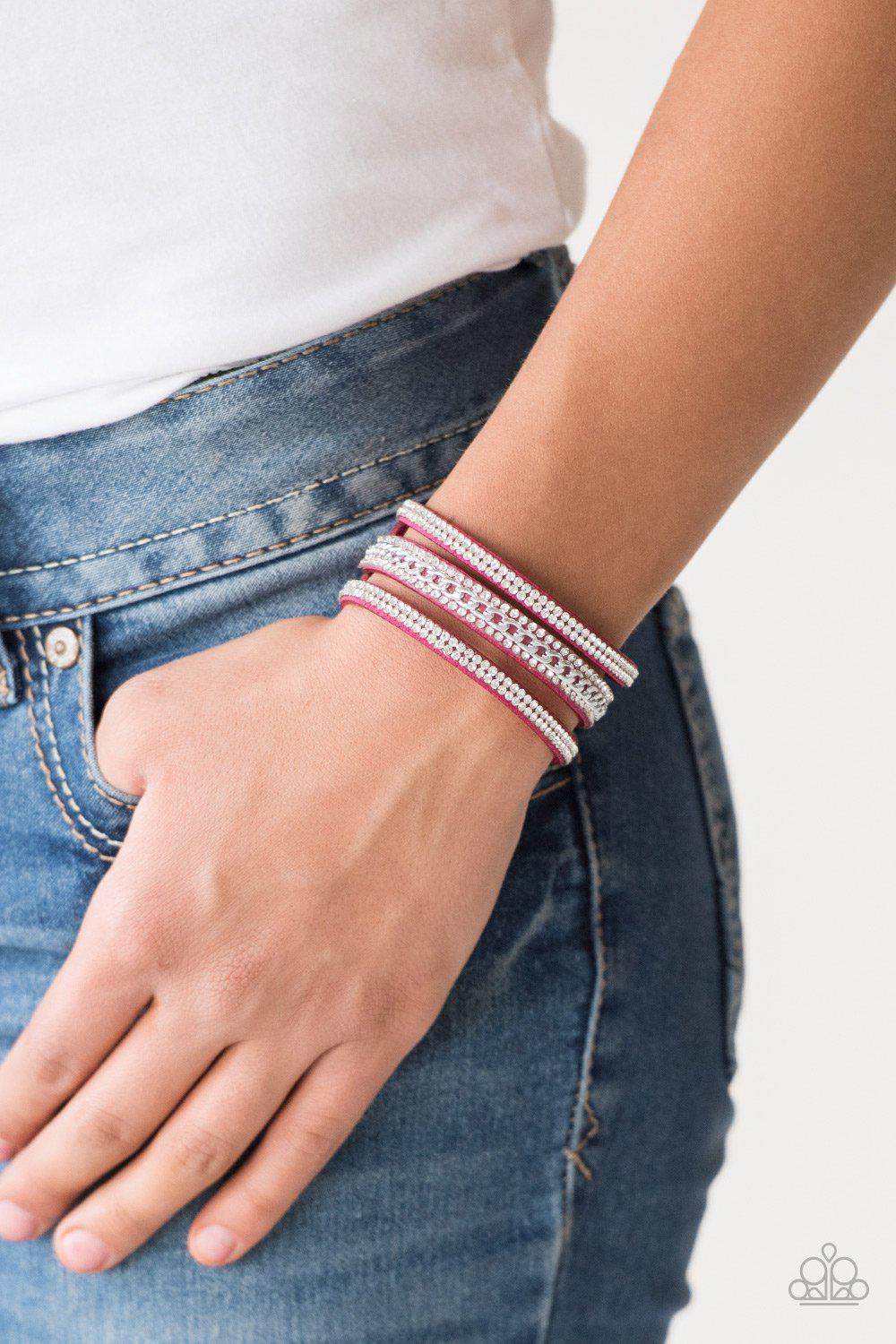 Rollin' In Rhinestones Pink Urban Wrap Snap Bracelet - Paparazzi Accessories- on model - CarasShop.com - Paparazzi Jewelry by Cara Jewels
