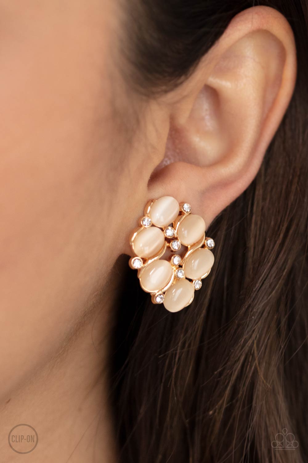 Row, Row, Row Your YACHT Gold Cat's Eye Stone Clip-On Earrings - Paparazzi Accessories- on model - CarasShop.com - Paparazzi Jewelry by Cara Jewels