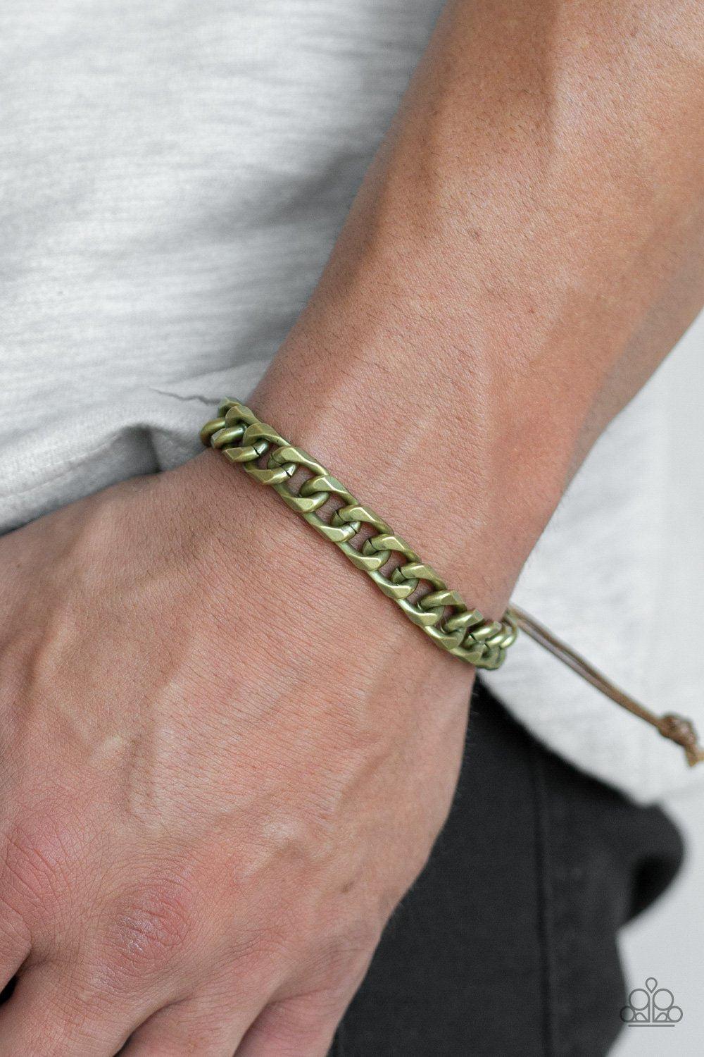 Rulebreaker Men's Brass Urban Bracelet - Paparazzi Accessories- on model - CarasShop.com - Paparazzi Jewelry by Cara Jewels