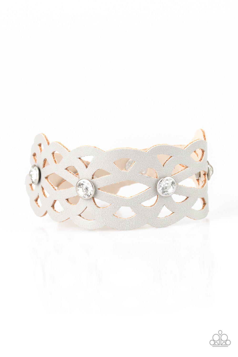 Runaway Radiance Silver Leather Wrap Snap Bracelet - Paparazzi Accessories- on model - CarasShop.com - Paparazzi Jewelry by Cara Jewels