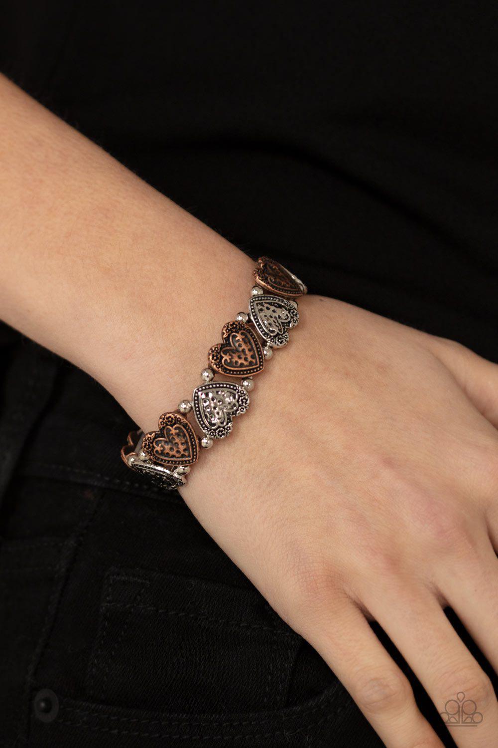 Rustic Heartthrob Multi Copper and Silver Heart Bracelet - Paparazzi Accessories- on model - CarasShop.com - Paparazzi Jewelry by Cara Jewels