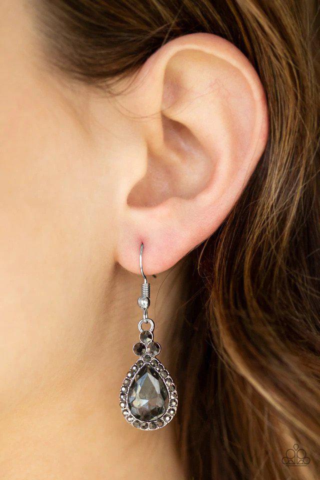 Self-made Millionaire Silver Teardrop Earrings - Paparazzi Accessories- on model - CarasShop.com - Paparazzi Jewelry by Cara Jewels