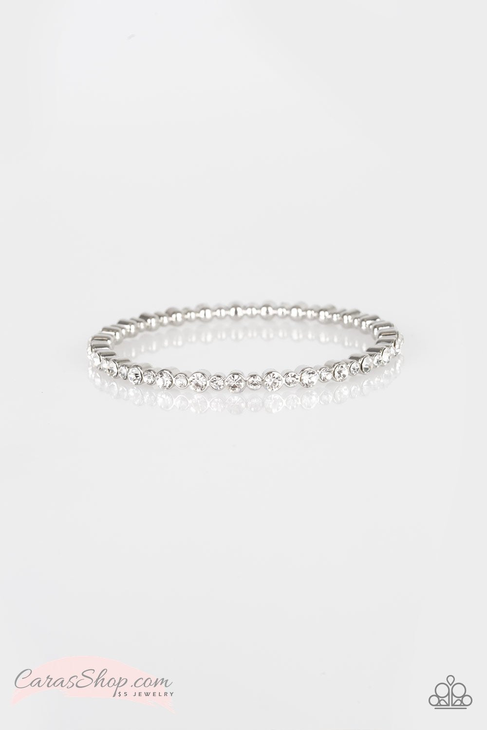 Seven Figure Fabulous - White Rhinestone Bangle Bracelet - Paparazzi Accessories- on model - CarasShop.com - Paparazzi Jewelry by Cara Jewels