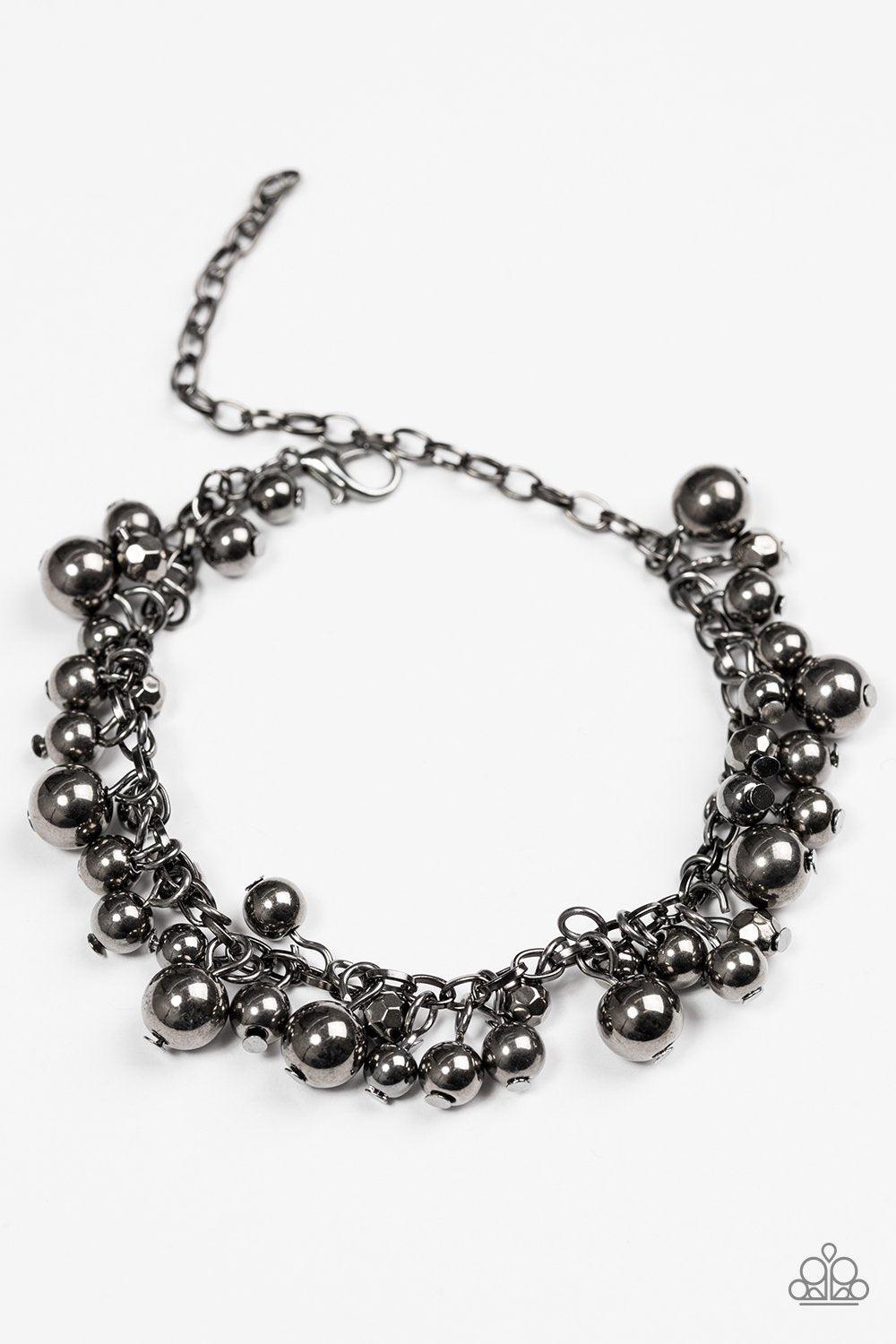 She's A Baller Gunmetal Black Bracelet - Paparazzi Accessories- on model - CarasShop.com - Paparazzi Jewelry by Cara Jewels