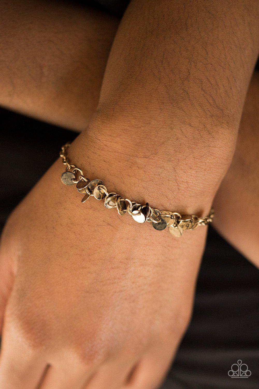 Shimmer Train Brass Bracelet - Paparazzi Accessories- on model - CarasShop.com - Paparazzi Jewelry by Cara Jewels