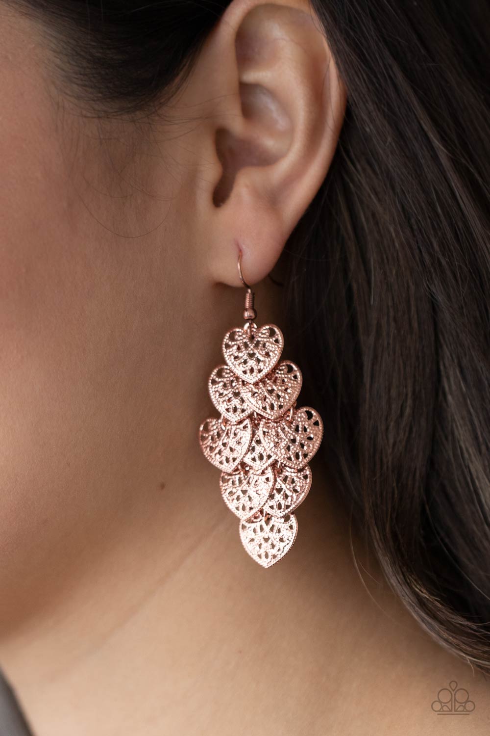 Shimmery Soulmates Copper Cascading Heart Earrings - Paparazzi Accessories- on model - CarasShop.com - Paparazzi Jewelry by Cara Jewels