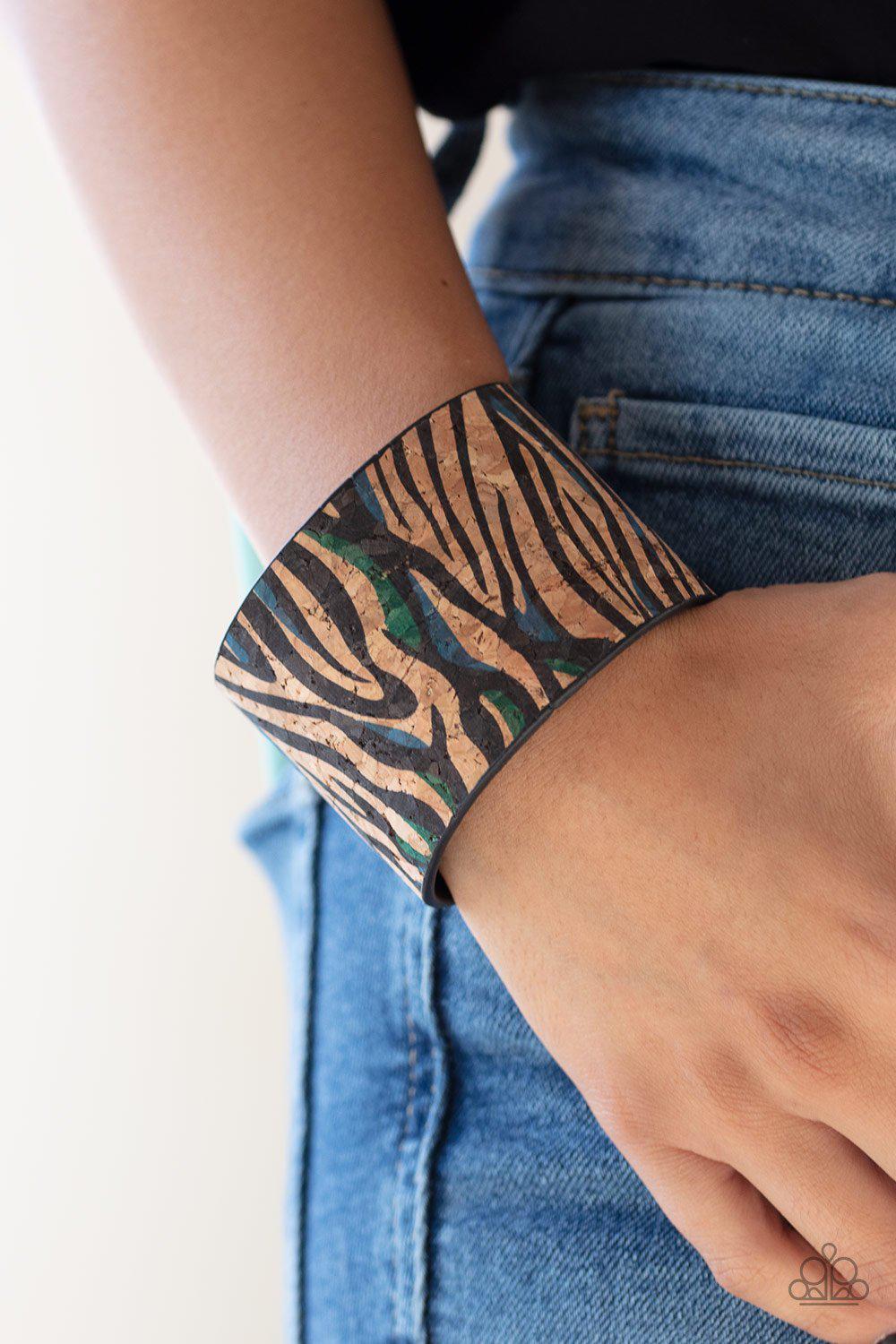 Show Your True Stripes Blue Animal Print Cork Cuff Bracelet - Paparazzi Accessories- on model - CarasShop.com - Paparazzi Jewelry by Cara Jewels