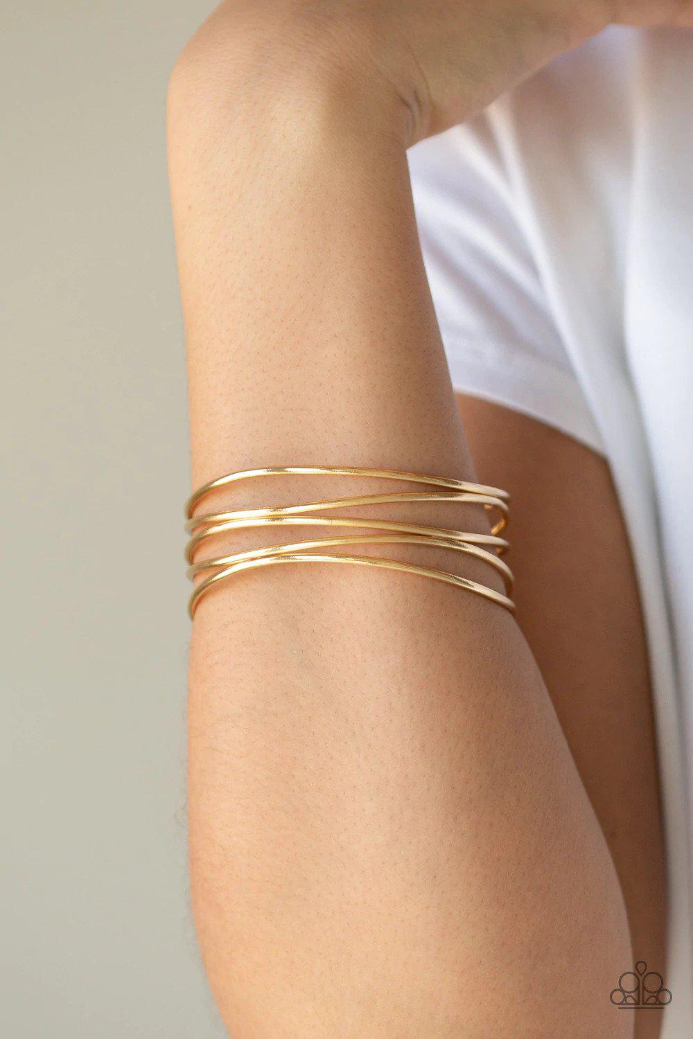 Showstopping Sheen Gold Bracelet - Paparazzi Accessories- on model - CarasShop.com - Paparazzi Jewelry by Cara Jewels