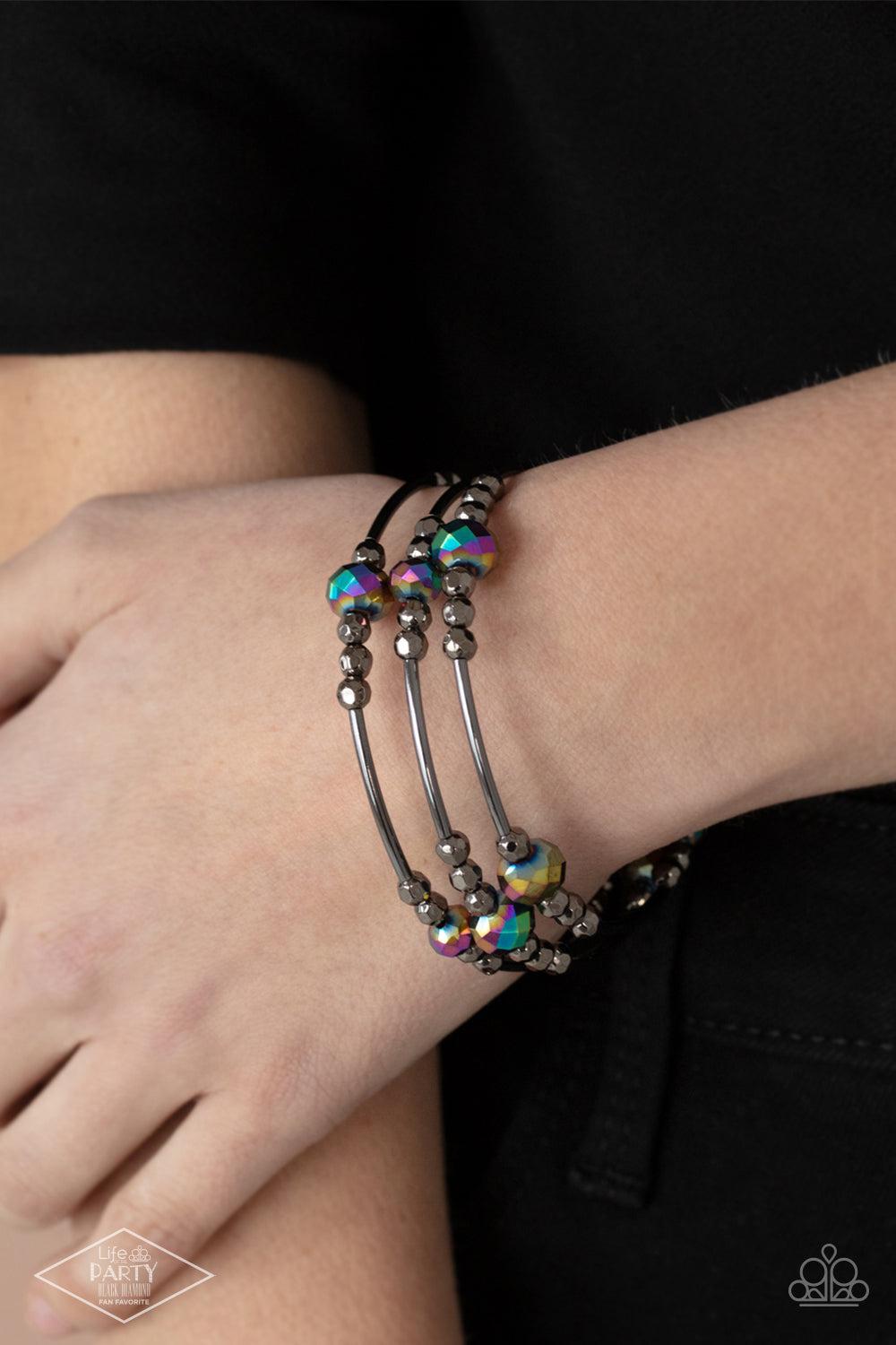 Showy Shimmer Multi "Oil Spill" Coil Bracelet - Paparazzi Accessories- on model - CarasShop.com - Paparazzi Jewelry by Cara Jewels