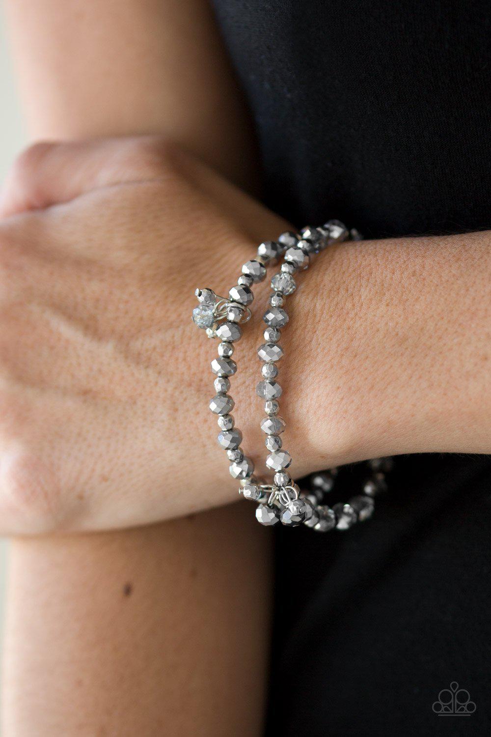 Sink or Shimmer Silver Smoky Crystal Stretch Bracelet Set - Paparazzi Accessories- on model - CarasShop.com - Paparazzi Jewelry by Cara Jewels