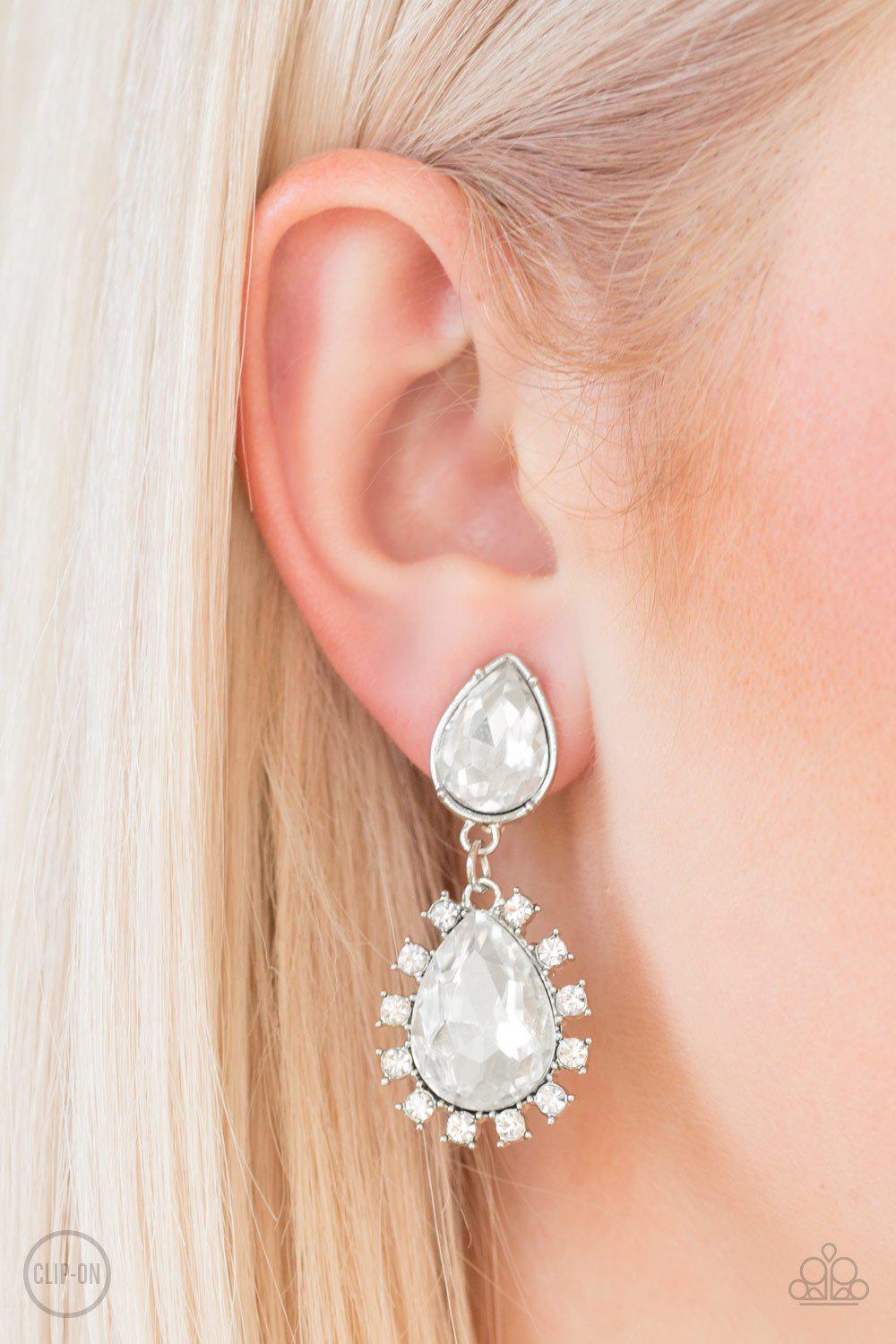 Sink or Swim White Rhinestone Clip-on Earrings - Paparazzi Accessories- on model - CarasShop.com - Paparazzi Jewelry by Cara Jewels