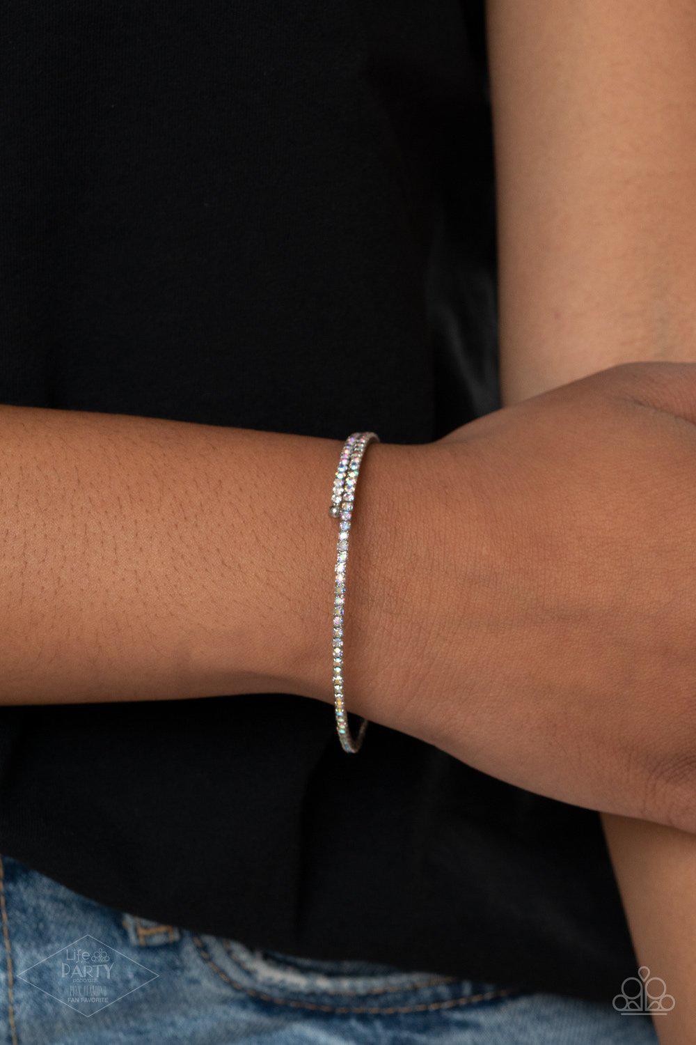 Sleek Sparkle Multi Iridescent Rhinestone Coil Bracelet - Paparazzi Accessories- on model - CarasShop.com - Paparazzi Jewelry by Cara Jewels