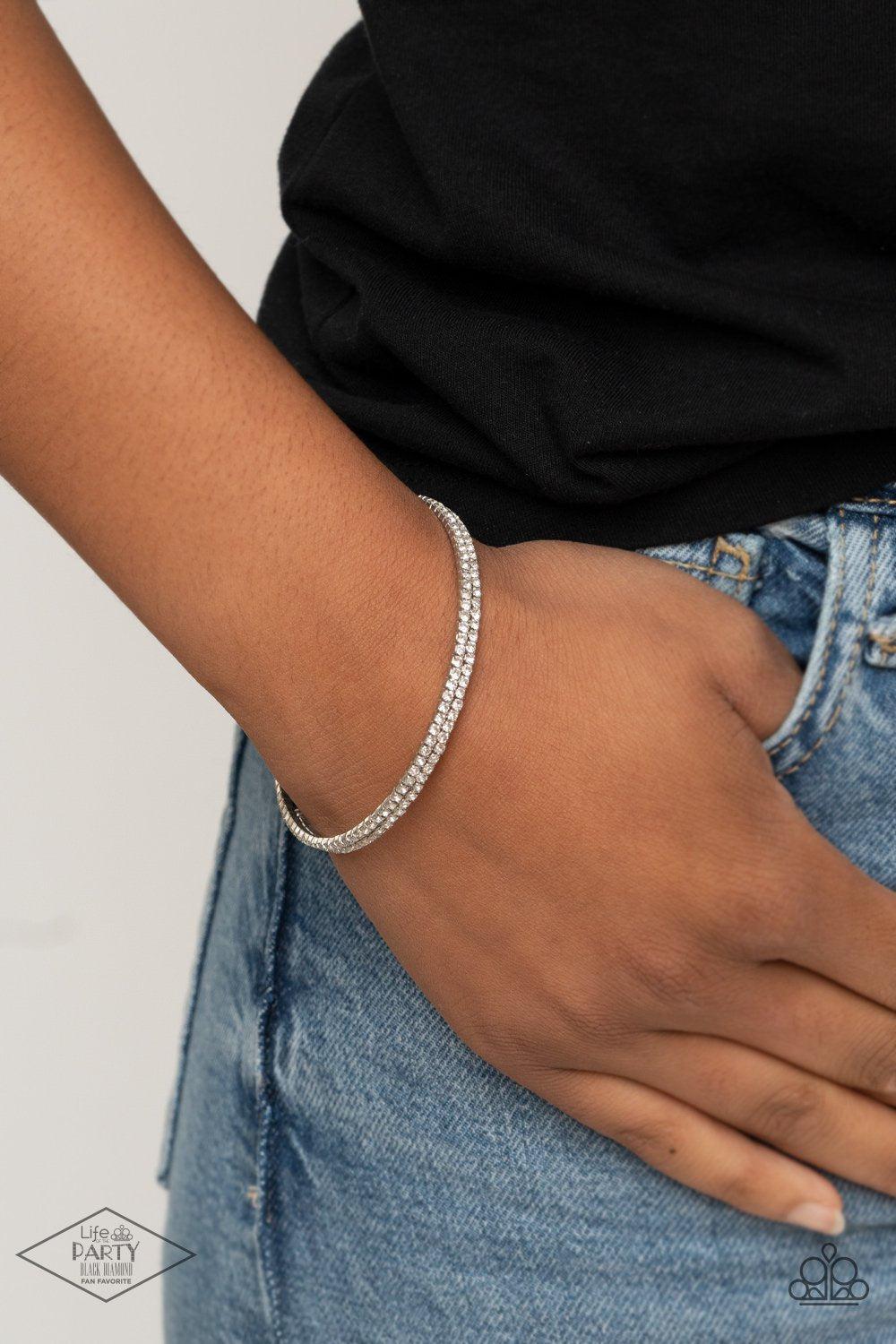 Sleek Sparkle White Rhinestone Coil Bracelet - Paparazzi Accessories- on model - CarasShop.com - Paparazzi Jewelry by Cara Jewels