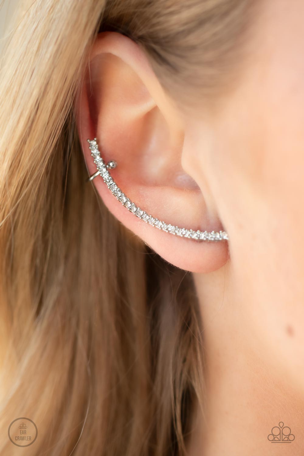 Sleekly Shimmering White Rhinestone Ear Crawler Earrings - Paparazzi Accessories- on model - CarasShop.com - Paparazzi Jewelry by Cara Jewels