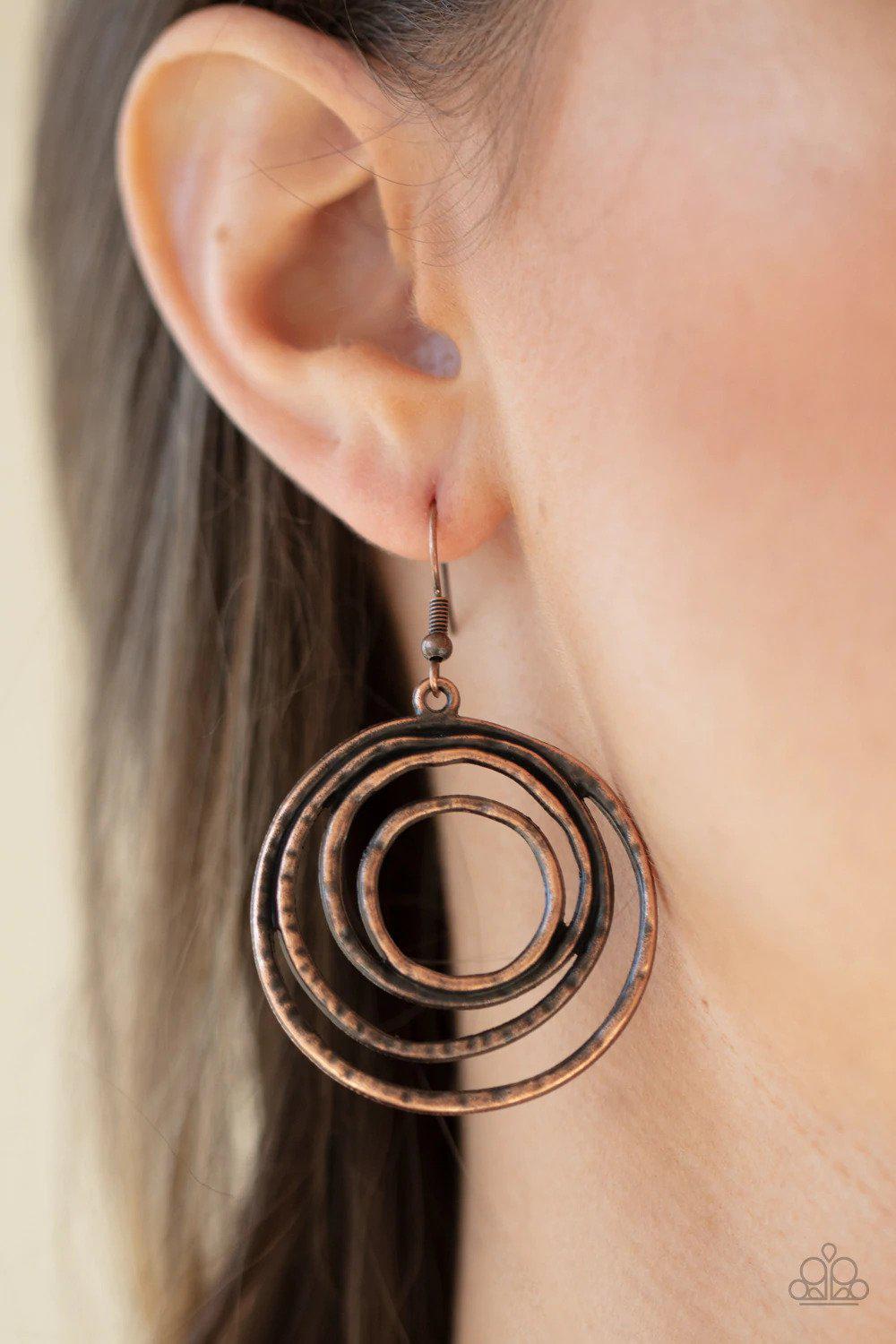 Spiraling Out Of Control Copper Earrings - Paparazzi Accessories- on model - CarasShop.com - Paparazzi Jewelry by Cara Jewels