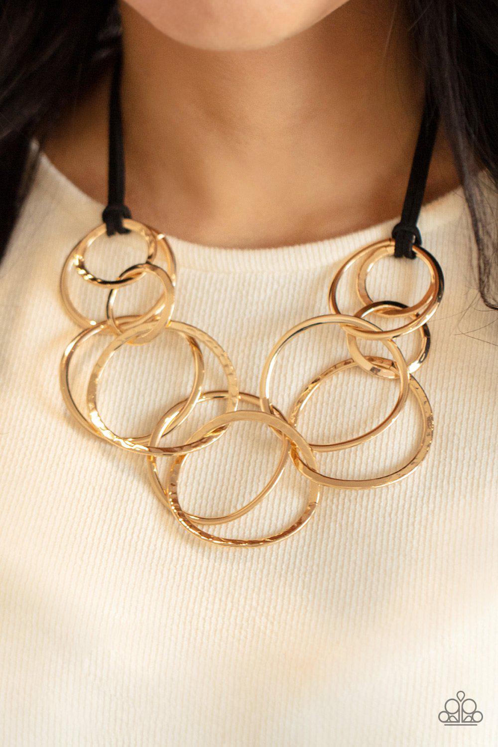 Spiraling Out of COUTURE Gold and Black Suede Necklace - Paparazzi Accessories- on model - CarasShop.com - Paparazzi Jewelry by Cara Jewels
