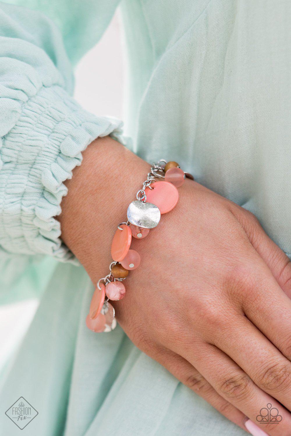 Springtime Springs Coral and Silver Bracelet - Paparazzi Accessories- on model - CarasShop.com - Paparazzi Jewelry by Cara Jewels