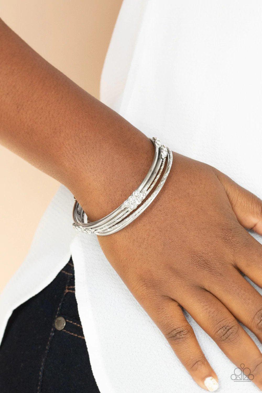 Stackable Sparkle White Rhinestone Bangle Bracelet Set - Paparazzi Accessories- on model - CarasShop.com - Paparazzi Jewelry by Cara Jewels