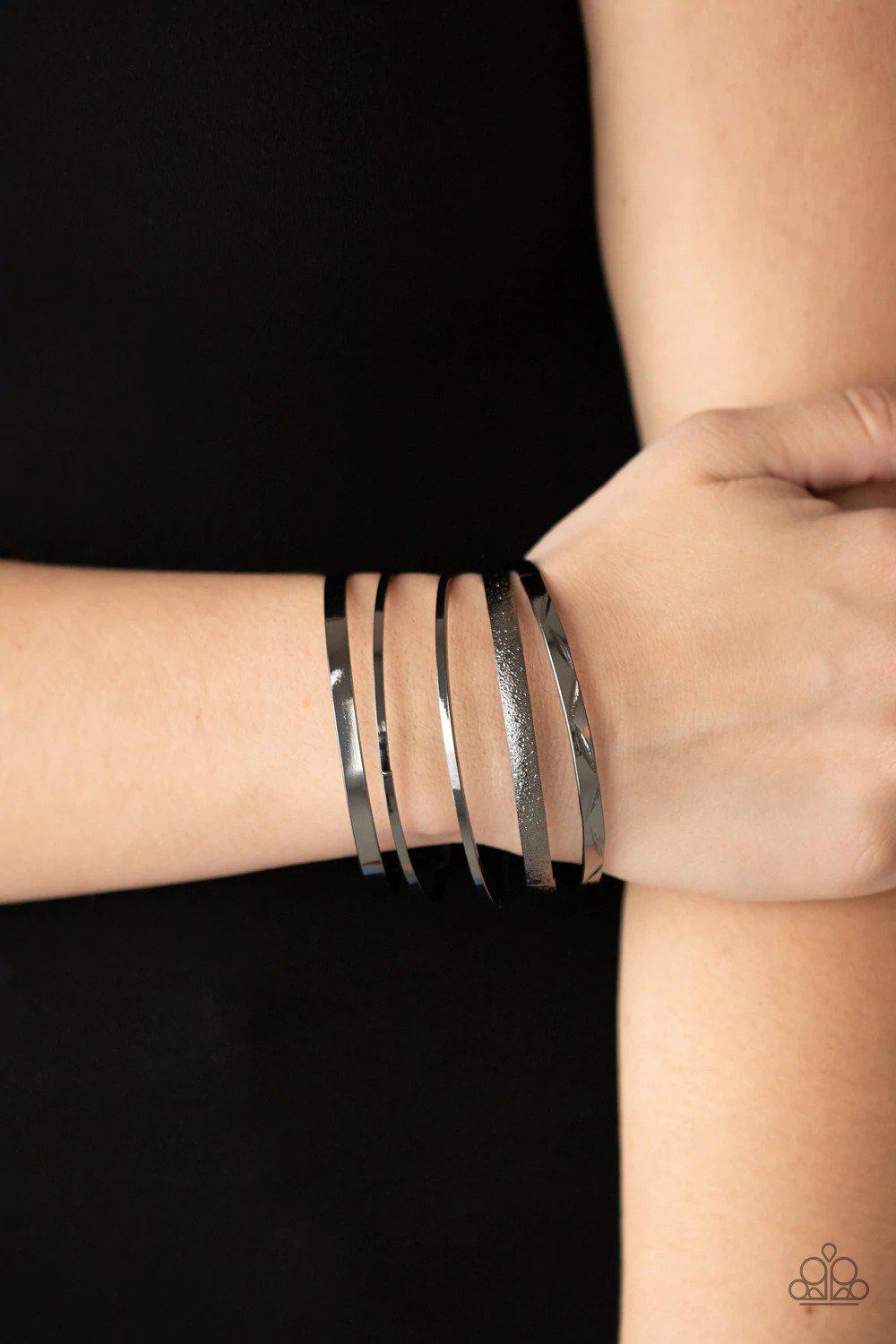 Stackable Style Gunmetal Black Bangle Bracelet Set - Paparazzi Accessories- on model - CarasShop.com - Paparazzi Jewelry by Cara Jewels