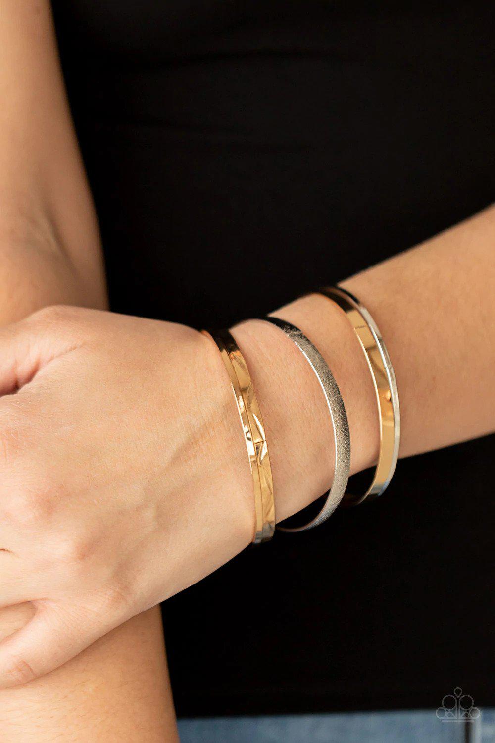 Stackable Style Multi Gold & Silver Bangle Bracelet Set - Paparazzi Accessories- on model - CarasShop.com - Paparazzi Jewelry by Cara Jewels