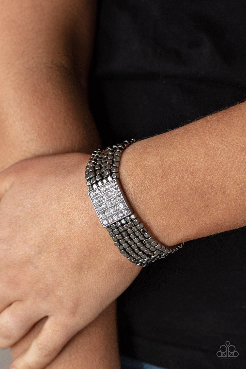 Star-Studded Showcase Gunmetal Black and White Rhinestone Bracelet - Paparazzi Accessories- on model - CarasShop.com - Paparazzi Jewelry by Cara Jewels