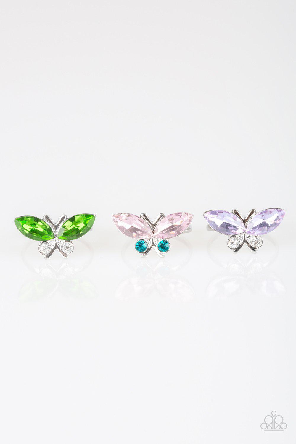 Starlet Shimmer Children's Rhinestone Butterfly Rings - Paparazzi Accessories (set of 5)- on model - CarasShop.com - Paparazzi Jewelry by Cara Jewels
