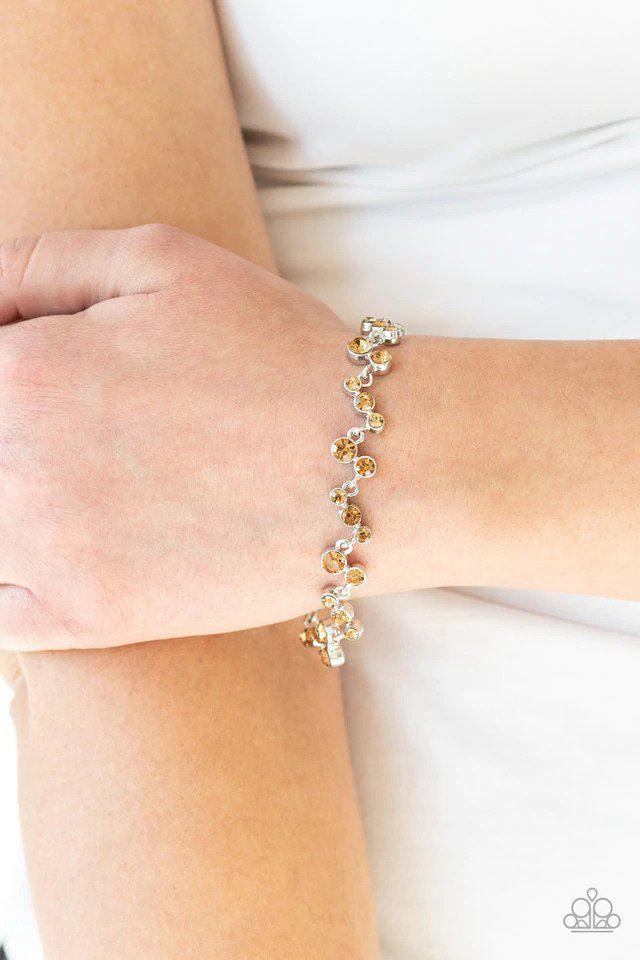 Starlit Stunner Brown Rhinestone Bracelet - Paparazzi Accessories- on model - CarasShop.com - Paparazzi Jewelry by Cara Jewels