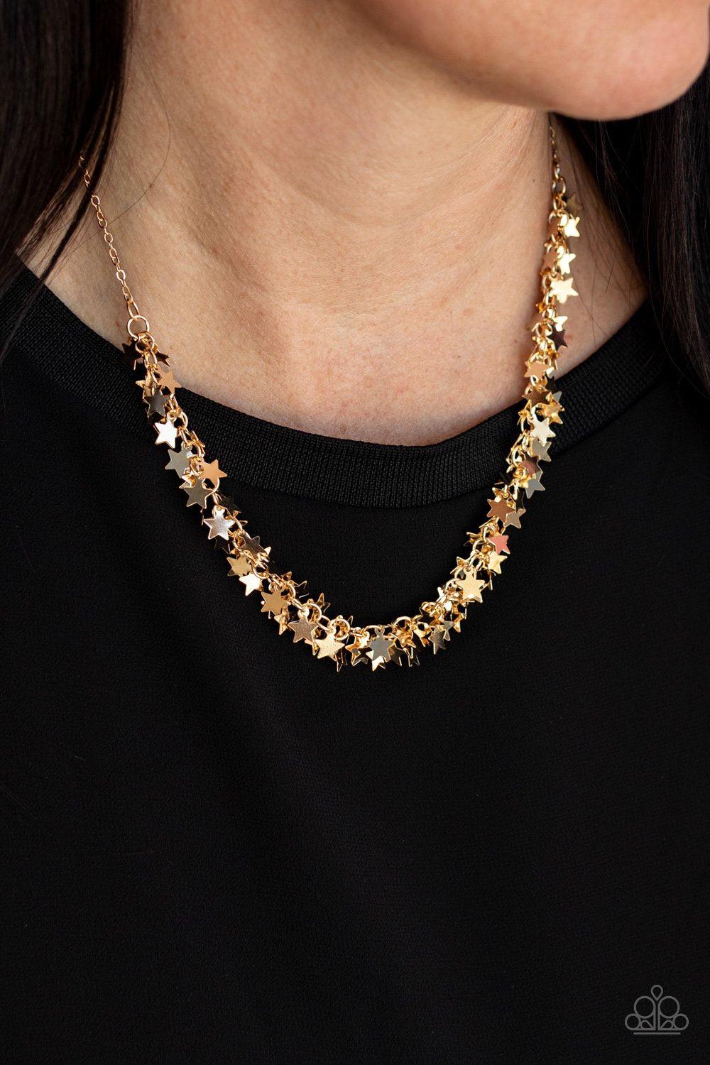 Starry Anthem Gold Star Necklace - Paparazzi Accessories- on model - CarasShop.com - Paparazzi Jewelry by Cara Jewels