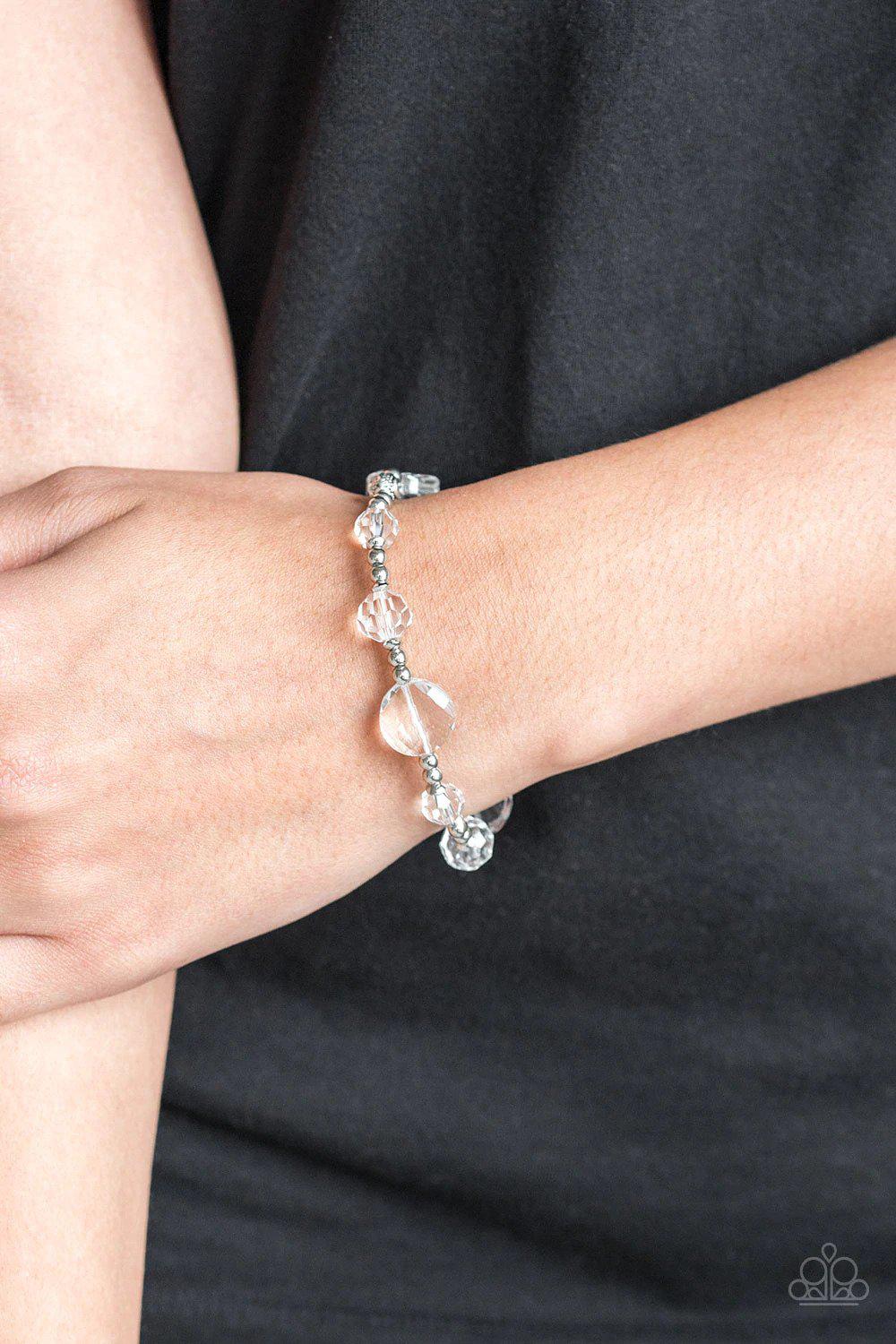 Starry-Eyed Elegance White Bracelet - Paparazzi Accessories- on model - CarasShop.com - Paparazzi Jewelry by Cara Jewels