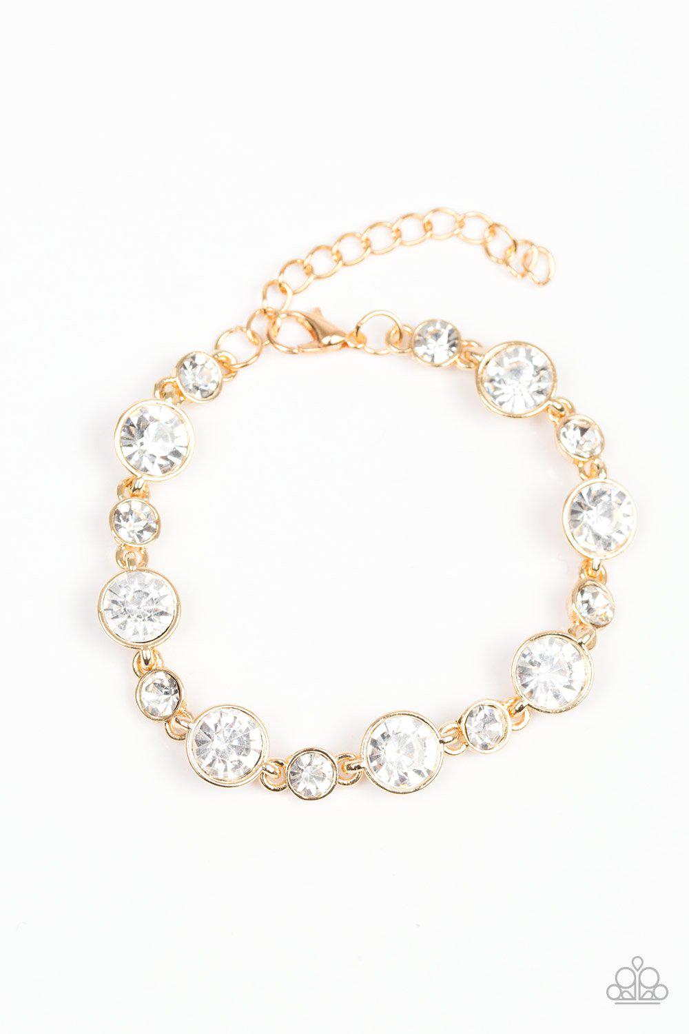 Starstruck Sparkle Gold and White Rhinestone Bracelet - Paparazzi Accessories- on model - CarasShop.com - Paparazzi Jewelry by Cara Jewels