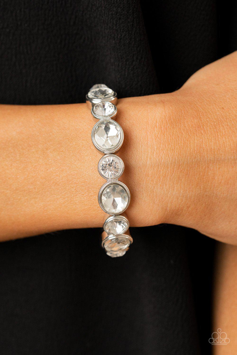Still GLOWING Strong White Rhinestone Bracelet - Paparazzi Accessories- lightbox - CarasShop.com - Paparazzi Jewelry by Cara Jewels
