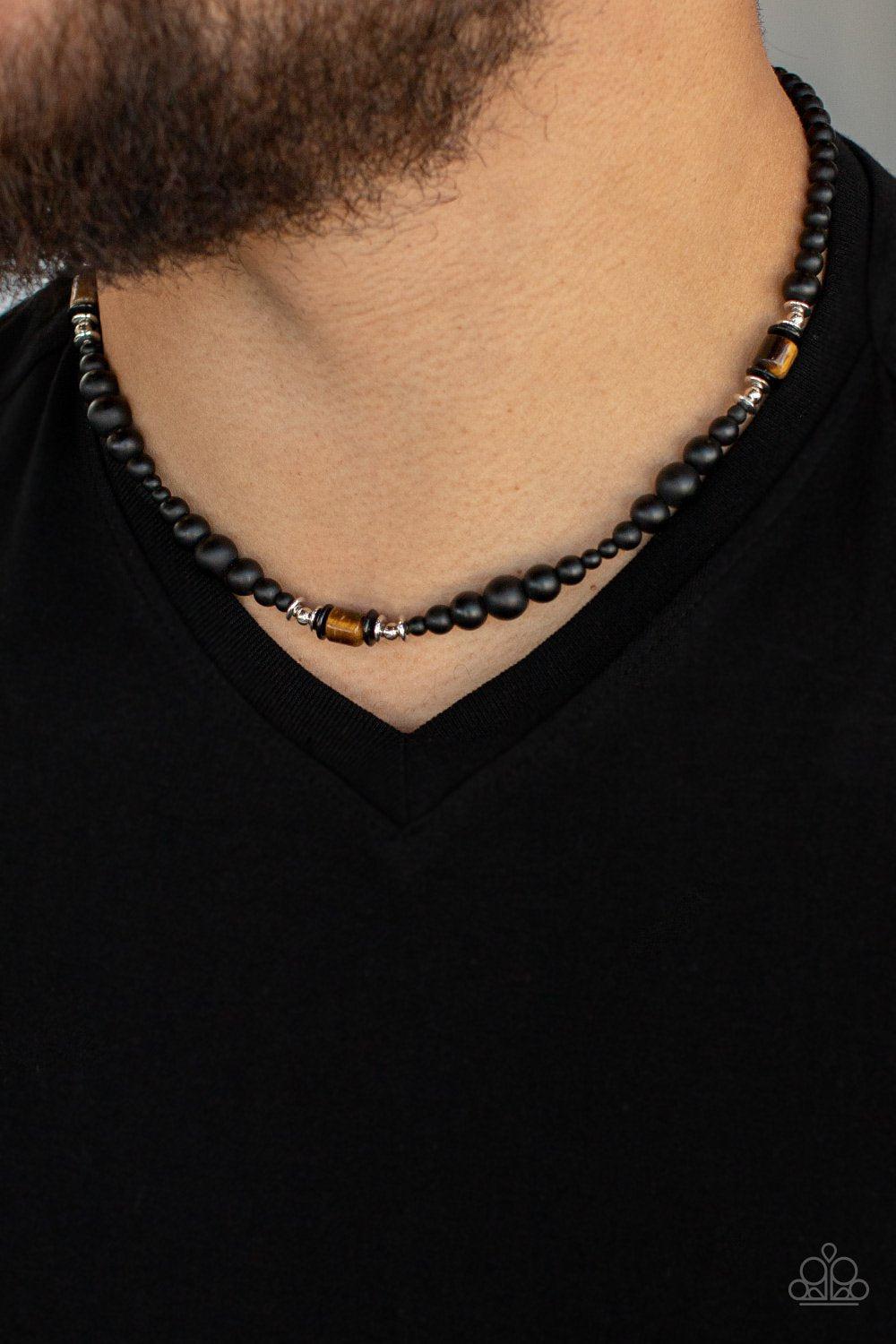 Stone Synchrony Men's Brown Tiger's Eye and Black Stone Urban Necklace - Paparazzi Accessories- on model - CarasShop.com - Paparazzi Jewelry by Cara Jewels