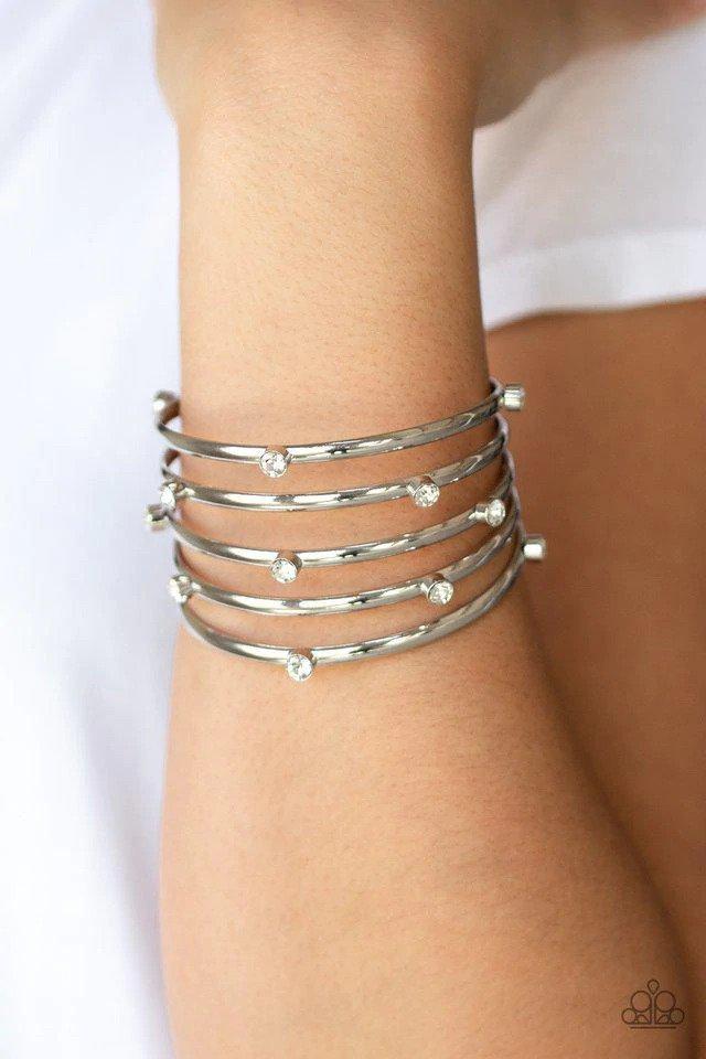 Sugarlicious Sparkle White Cuff Bracelet - Paparazzi Accessories- on model - CarasShop.com - Paparazzi Jewelry by Cara Jewels