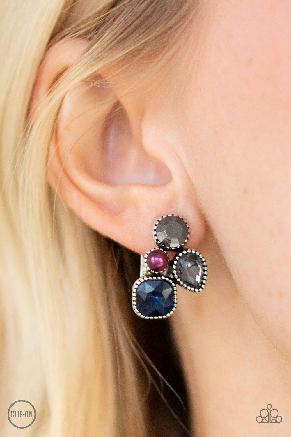 Super Superstar Multi Blue and Silver Clip On Earrings - Paparazzi Accessories- on model - CarasShop.com - Paparazzi Jewelry by Cara Jewels