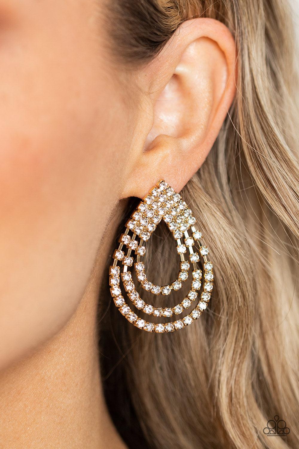 Take a POWER Stance Gold & White Rhinestone Earrings - Paparazzi Accessories- on model - CarasShop.com - Paparazzi Jewelry by Cara Jewels