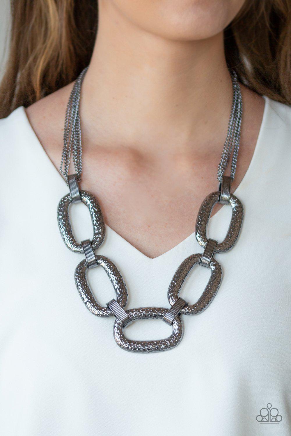 Take Charge Black Gunmetal Necklace - Paparazzi Accessories- on model - CarasShop.com - Paparazzi Jewelry by Cara Jewels