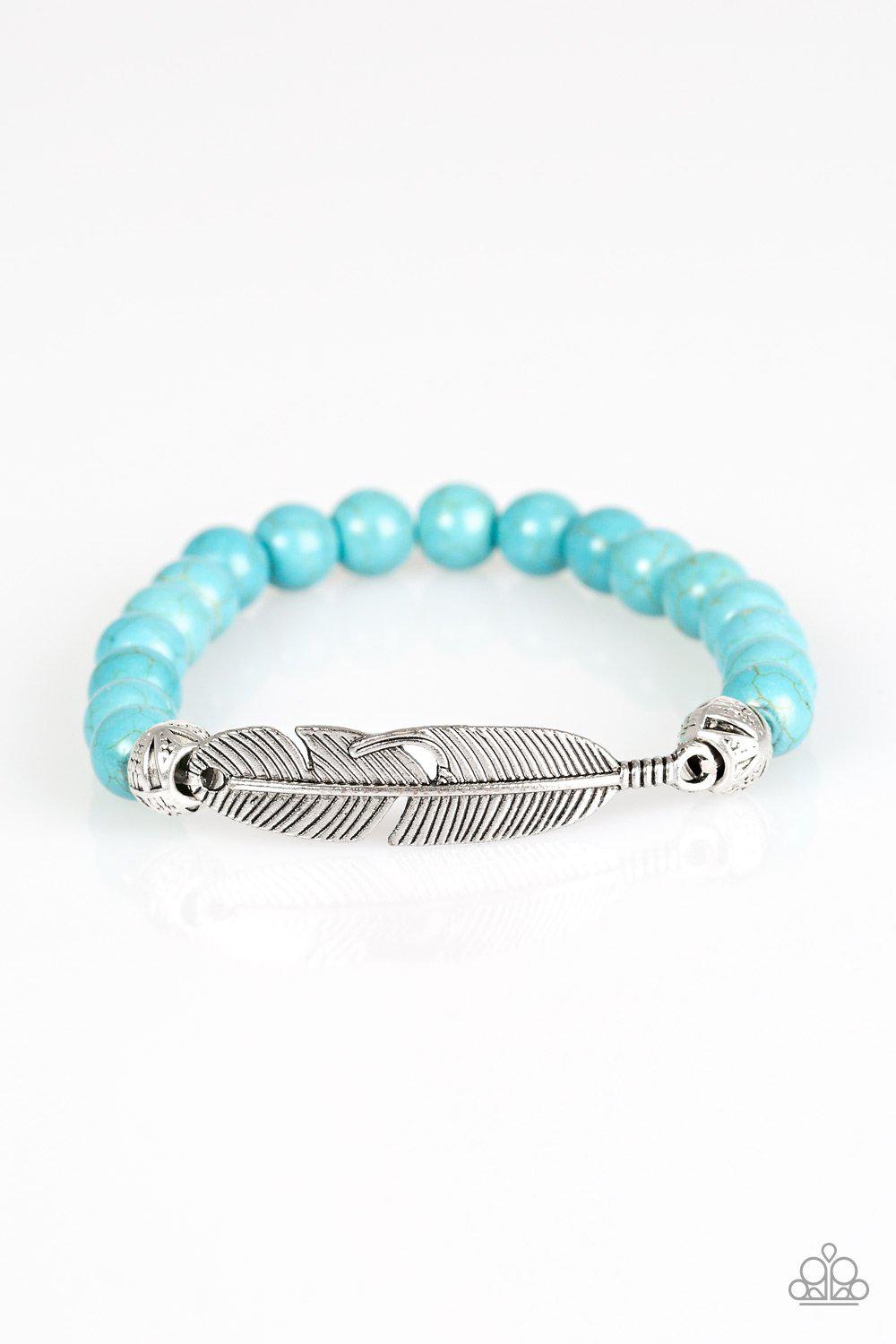 Take Wing Turquoise Blue Stone and Silver Feather Bracelet - Paparazzi Accessories- on model - CarasShop.com - Paparazzi Jewelry by Cara Jewels