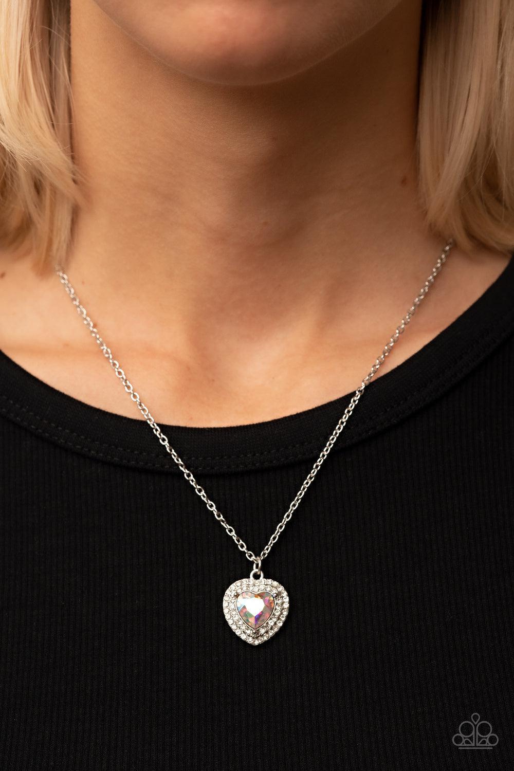 Taken with Twinkle Multi Iridescent Rhinestone Heart Necklace - Paparazzi Accessories- on model - CarasShop.com - Paparazzi Jewelry by Cara Jewels
