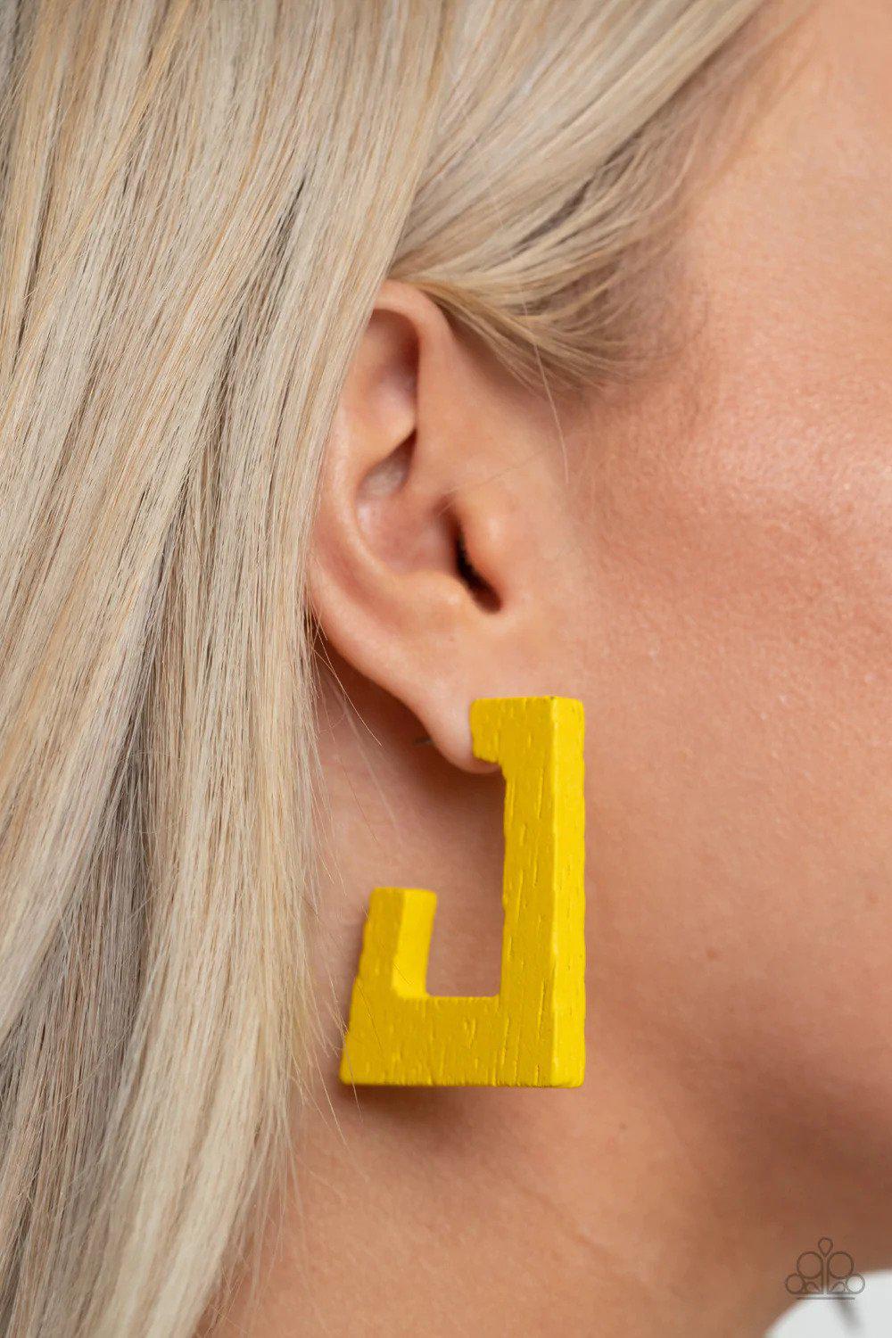 The Girl Next OUTDOOR Yellow Wood Hoop Earrings - Paparazzi Accessories- on model - CarasShop.com - Paparazzi Jewelry by Cara Jewels