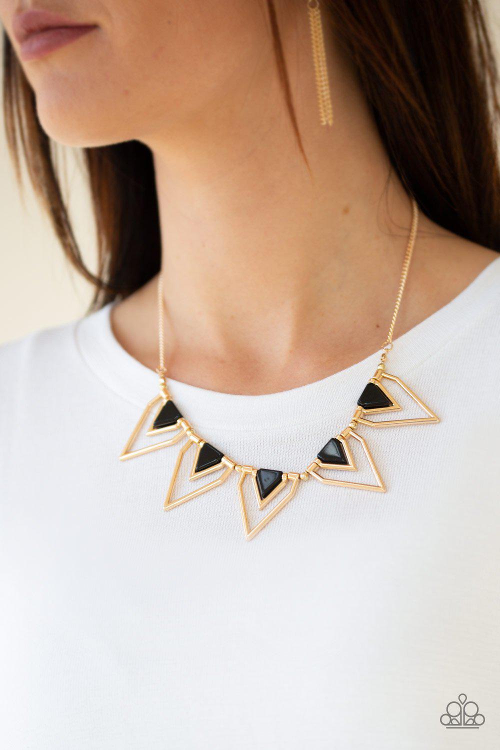 The Pack Leader Gold and Black Necklace - Paparazzi Accessories- on model - CarasShop.com - Paparazzi Jewelry by Cara Jewels