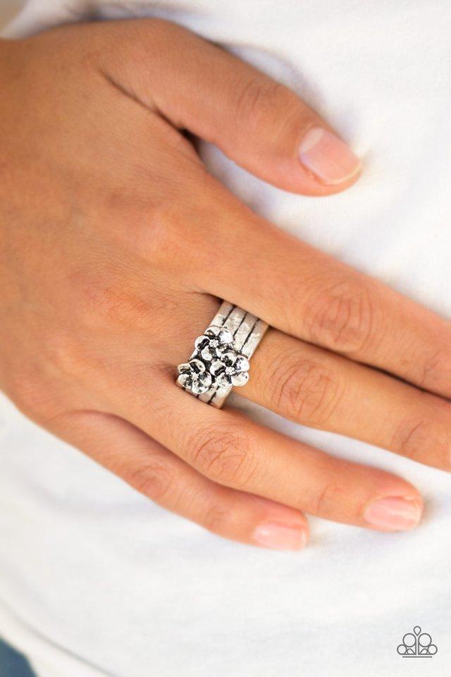 This ISLAND Is Your ISLAND Silver Flower Ring - Paparazzi Accessories- on model - CarasShop.com - Paparazzi Jewelry by Cara Jewels